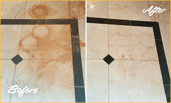 Before and After Picture of a Westerville Marble Floor Honed to Remove Rust Stains