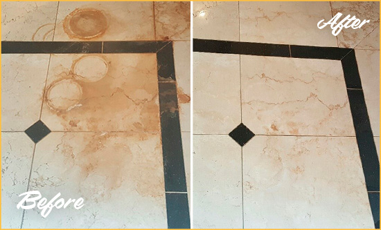 Before and After Picture of a Pickerington Hard Surface Restoration Service on a Marble Floor to Eliminate Rust Stains