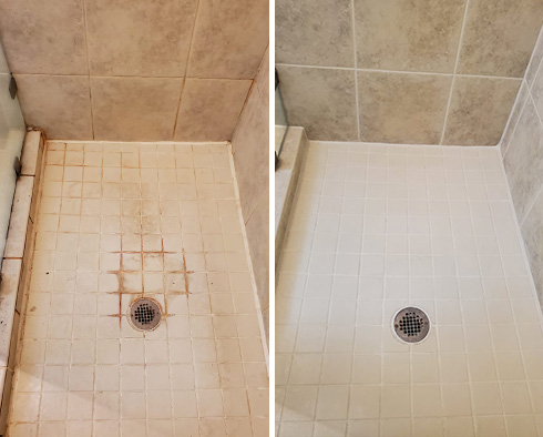 Shower Floor Before and After a Service from Our Tile and Grout Cleaners in Groveport